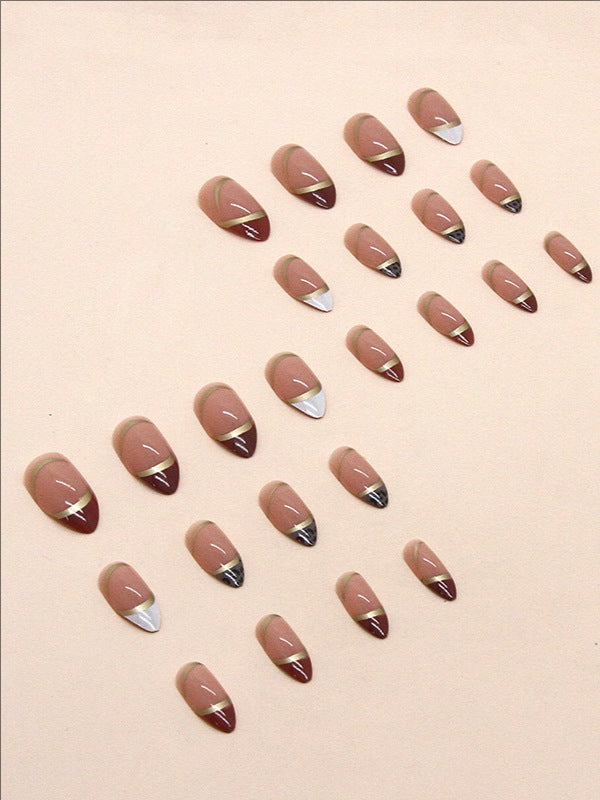 Press-on nail tips -Almond-shaped nails with shiny gold foil